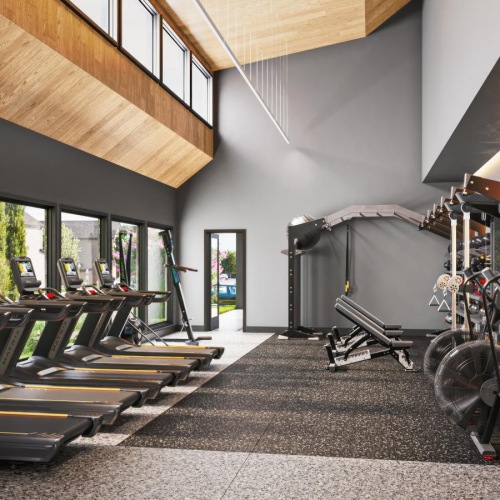 State-of-the-art amenities bright gym with workout equipment