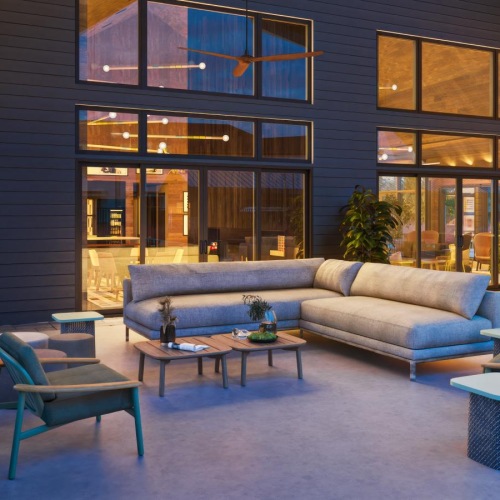 The essence of exceptional living outdoor patio with couches and chairs